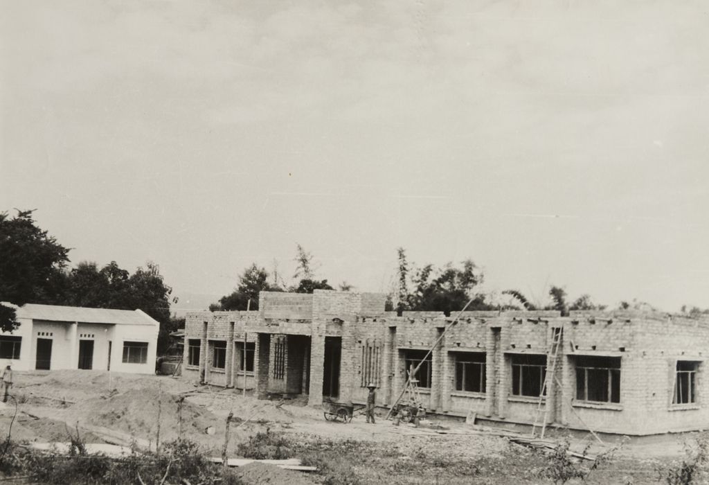 ກຳ​ມະ​ກອນ​ສ້າງ​ອາ​ຄານ