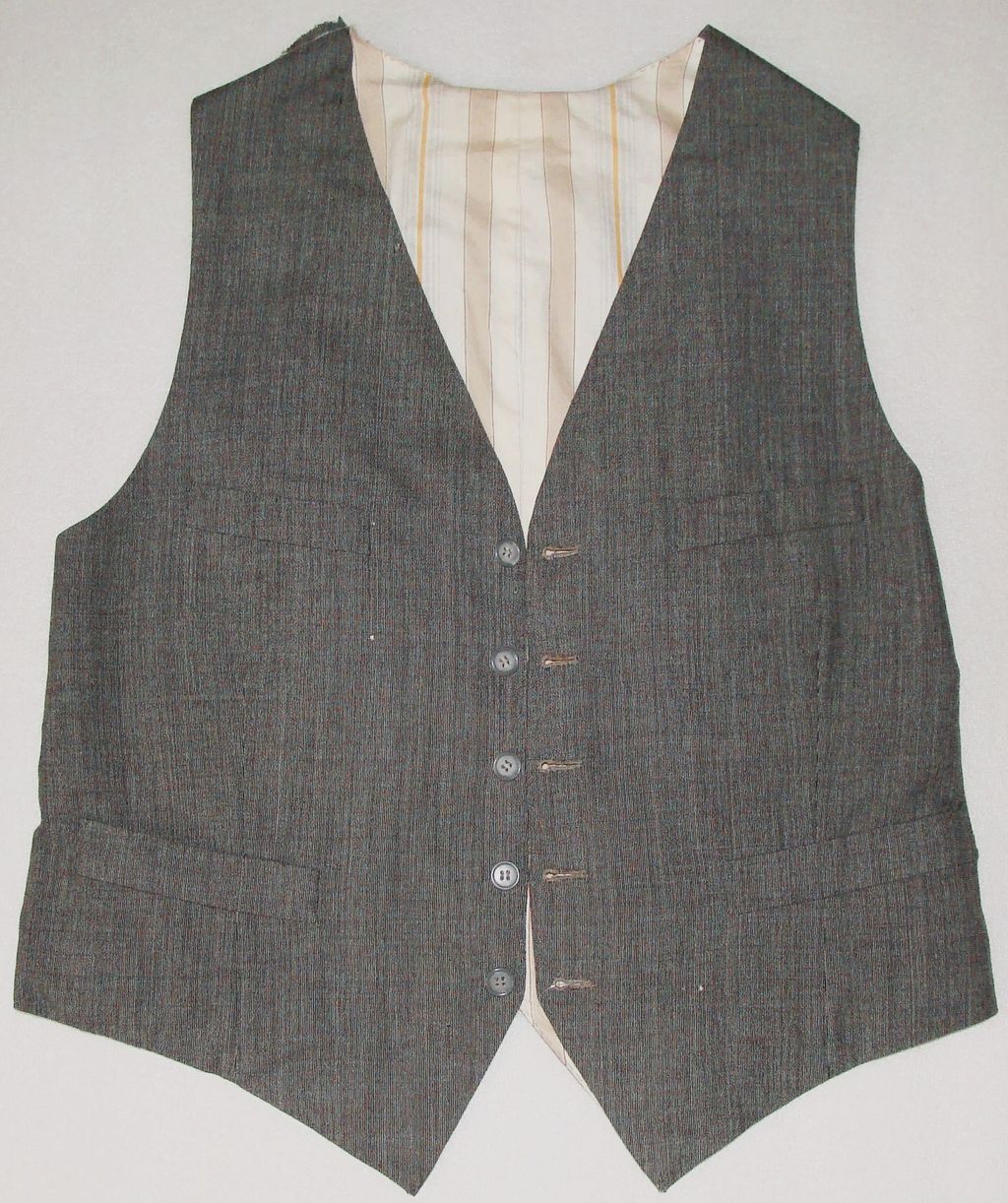 ເສື້ອກັກ ຜ້າສີຂີ້ເທົ່າ