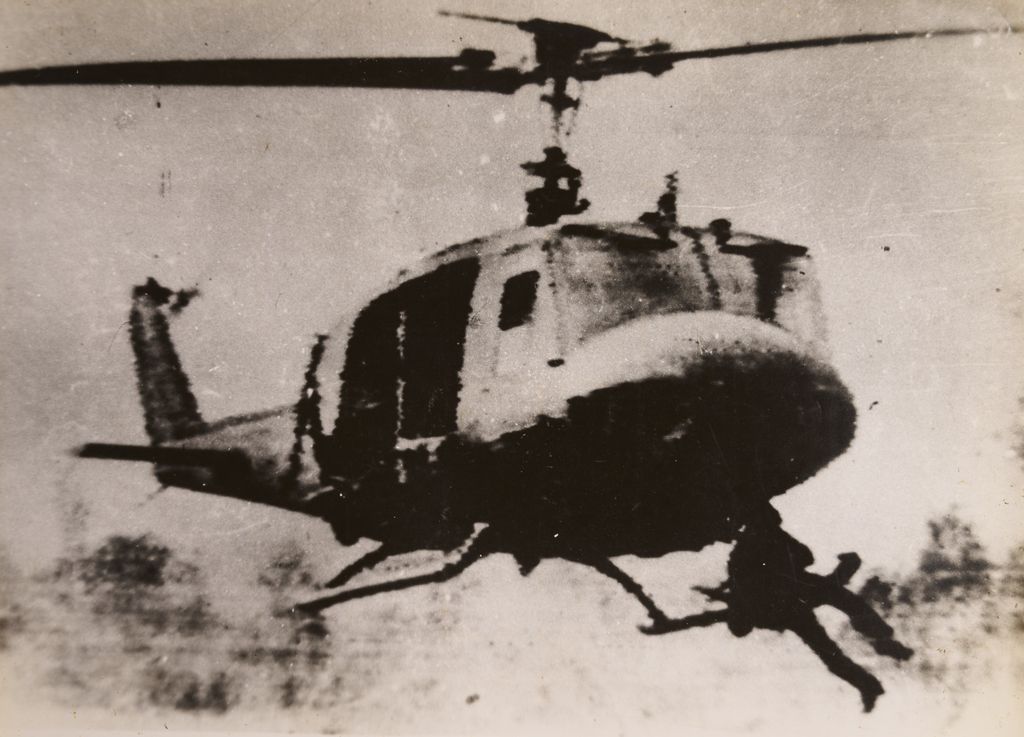 ຍົນ​ເຮ​ລີ​ຄອບ​ເຕີ