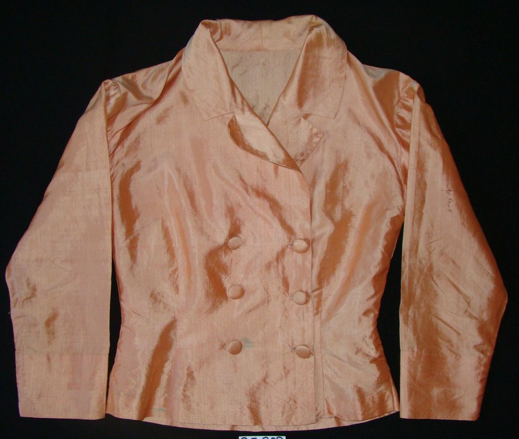 ເສື້ອຄໍປ້າຍ ຜ້າໄໝ ສີສົ້ມ.