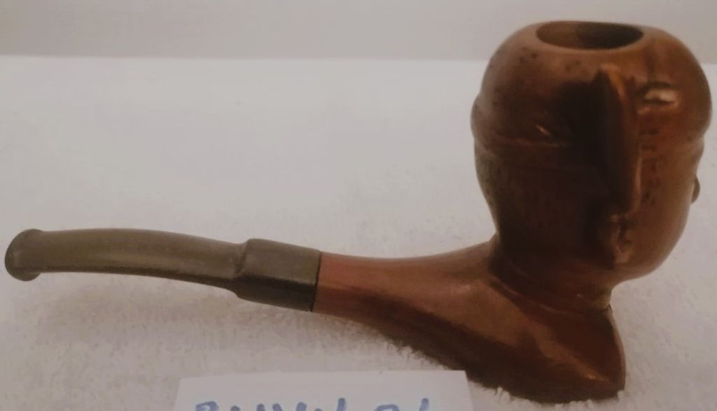 ກອກຢາສູບເຮັດດ້ວຍໄມ້ເປັນຮູບຫົວຄົນ