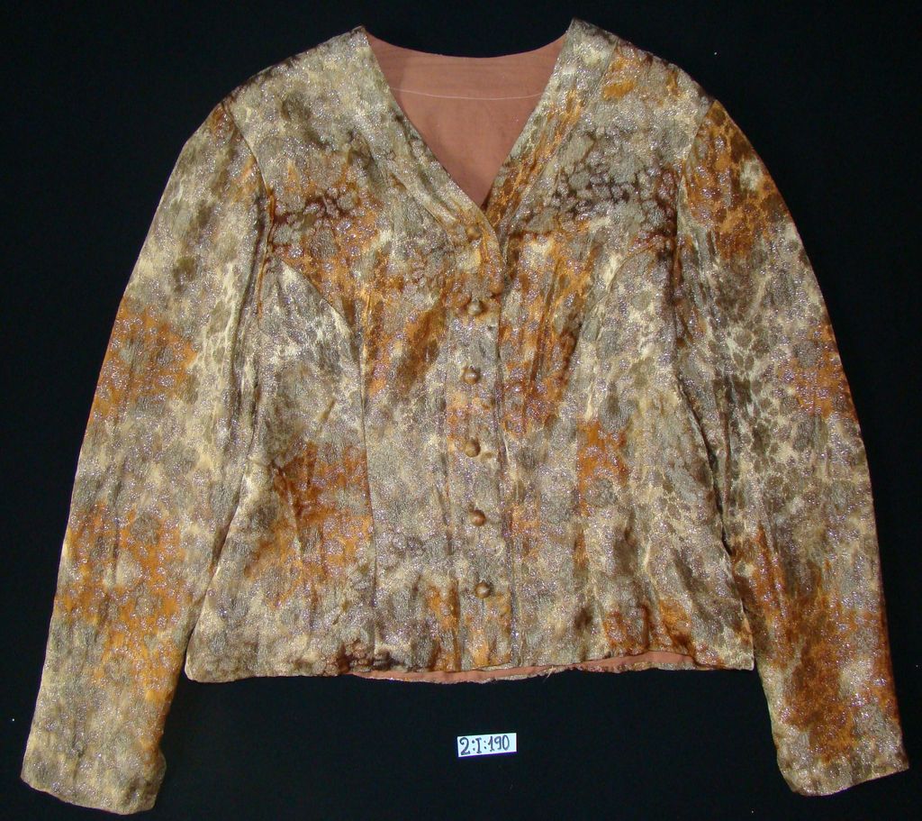 ເສື້ອຄໍປ້າຍ ຜ້າໄໝ ລາຍດອກ ສີສົ້ມ.