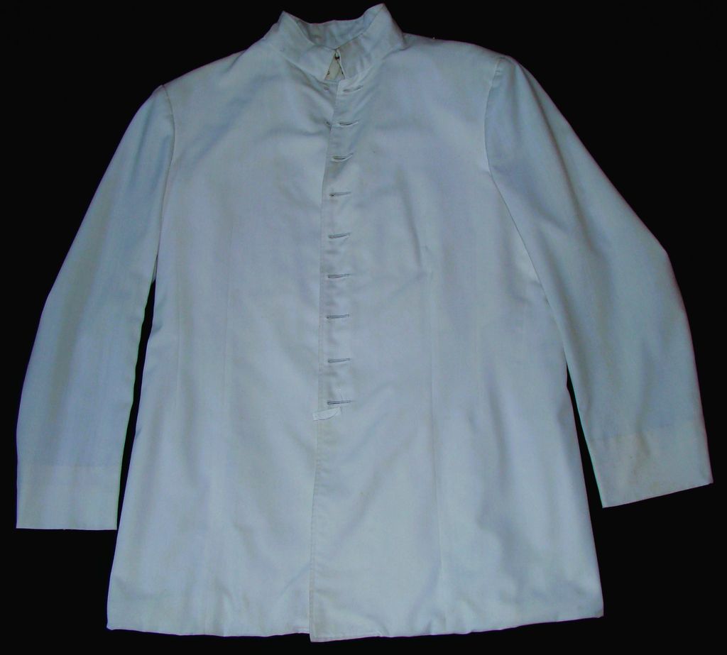 ເສື້ອຄໍປິດ ຜ້າສີຂາວ