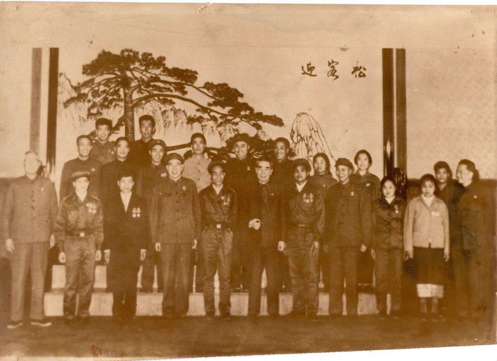 ການນຳຖ່າຍຮູບລວມໝູ່