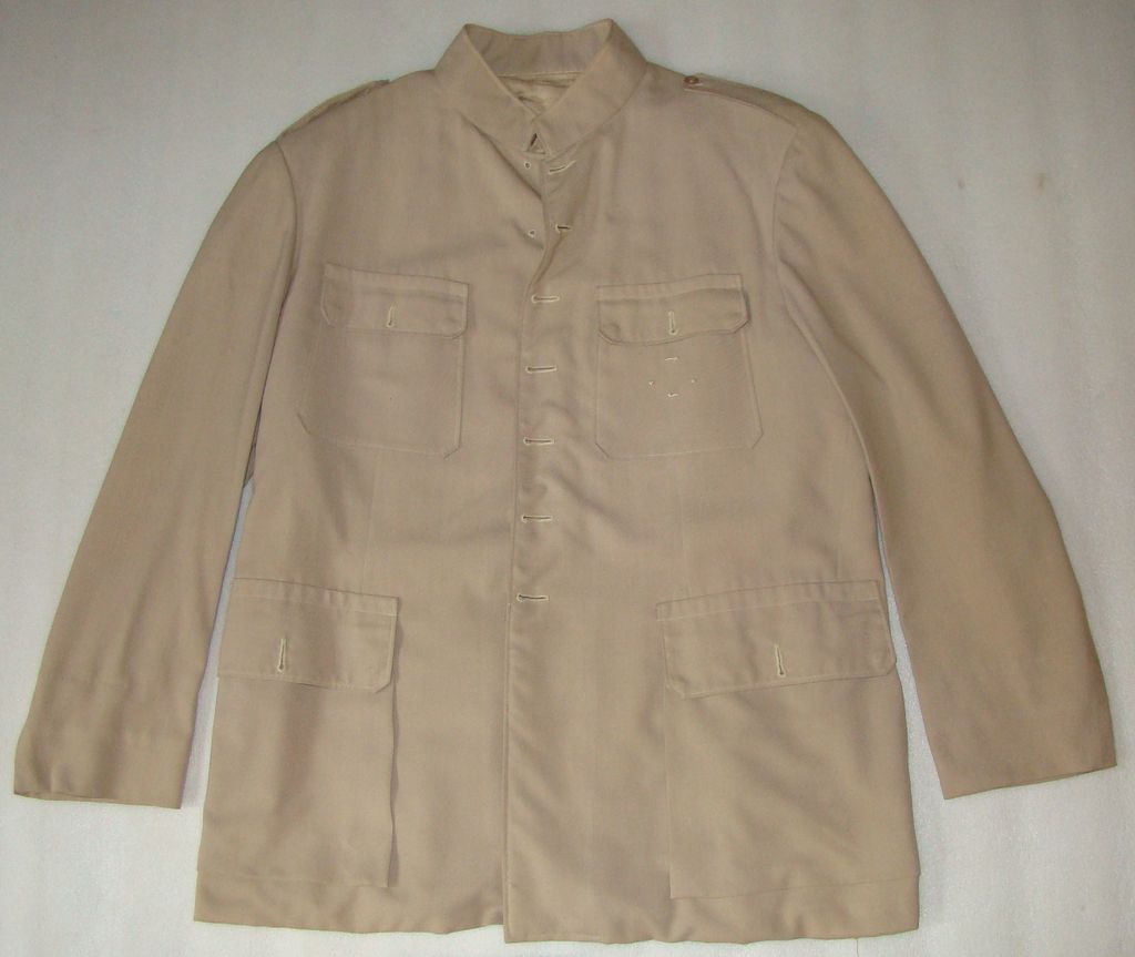 ເສື້ອຄໍປິດ ຜ້າສີກາກີ