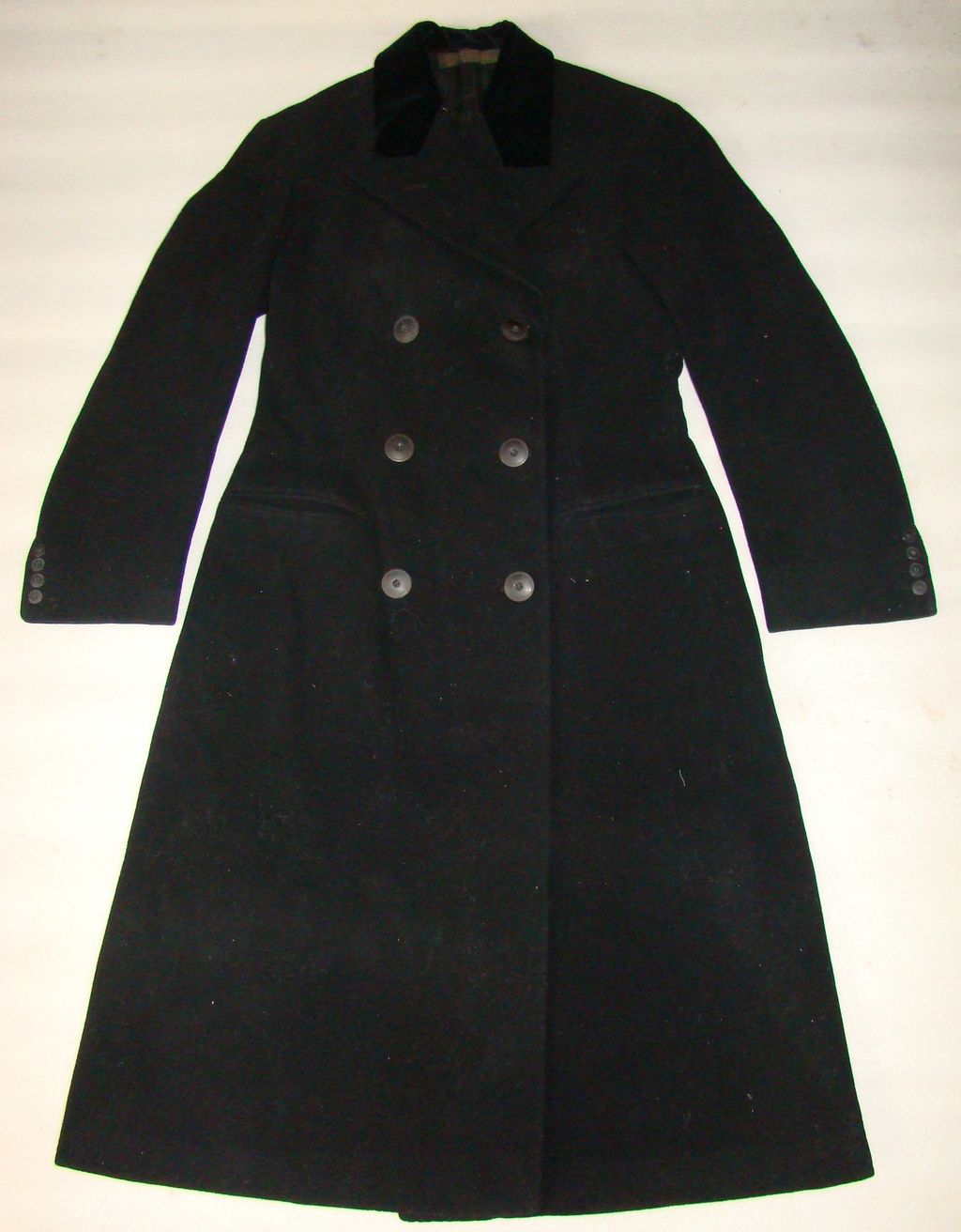 ເສື້ອມັງໂຕ ຜ້າຂົນ ສີດໍາ